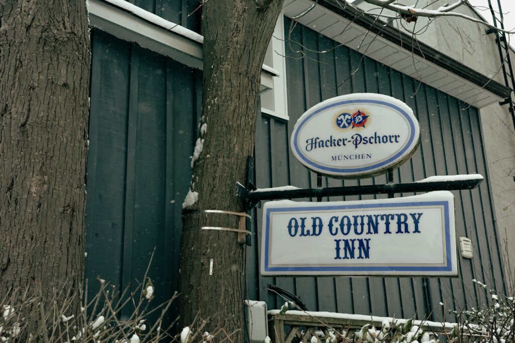 Old country inn sign on a building